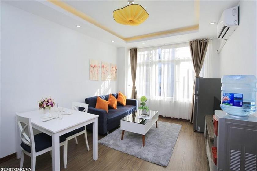 Sumitomo Building offers 1-bedroom, 60m2 serviced apartments for rent on Dao Tan Street near Lotte.